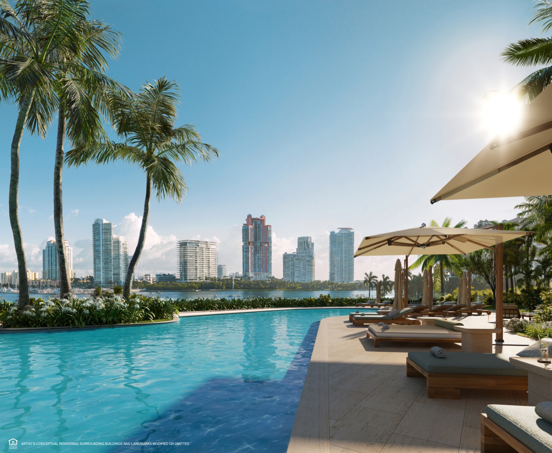 Bayfront pool at Six Fisher Island — outdoor spa, sunbeds, and cabanas with panoramic Biscayne Bay views, poolside food and beverage service.